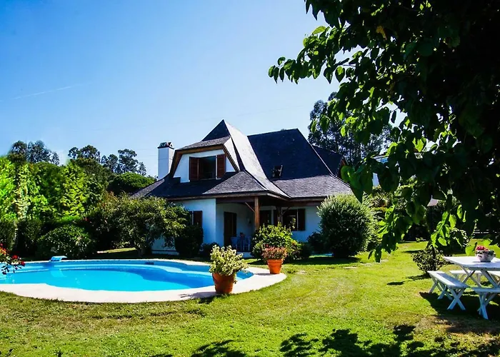 Chalet con piscina y 2000 m de jardín